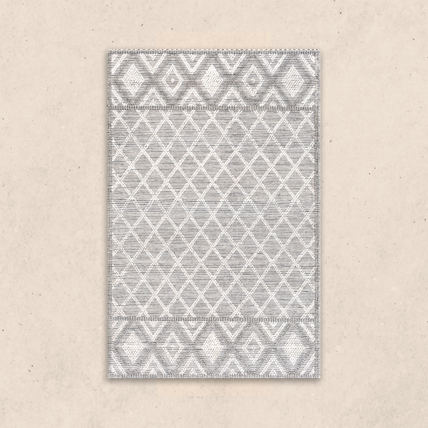 tapis-motif-geometrique-gris-blanc-decoratif
